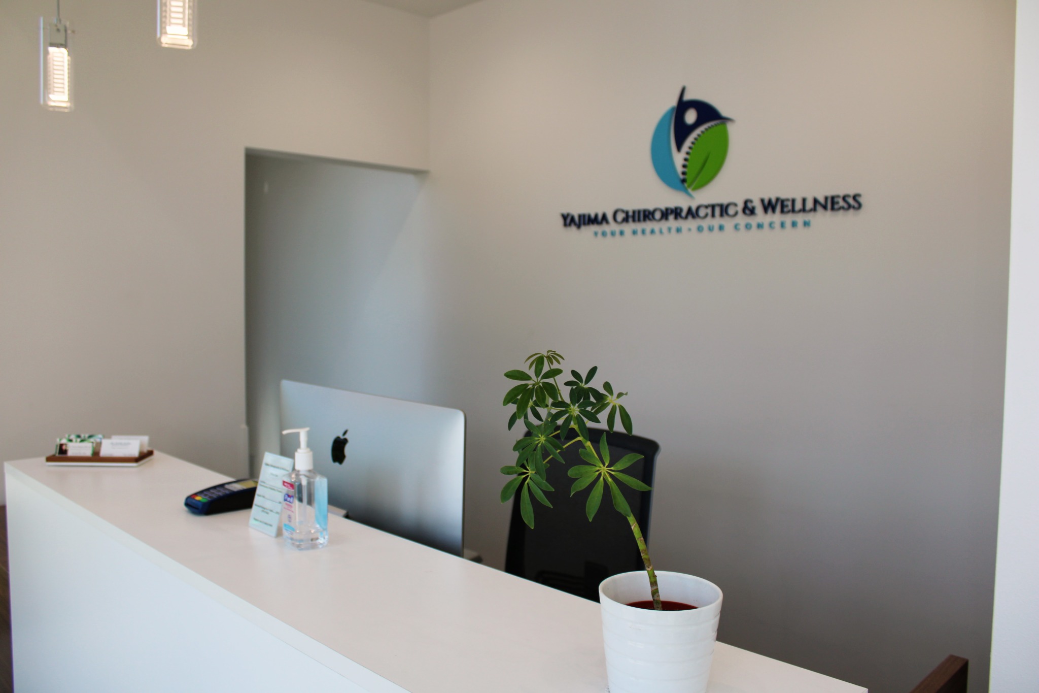 Front desk and reception area at Yajima Chiropractic & Wellness